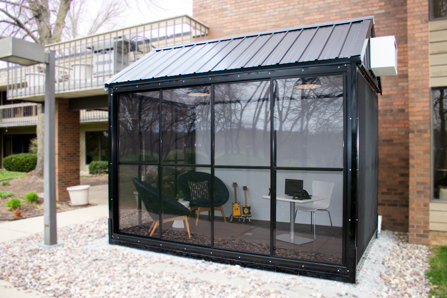 Photo of fully enclosed fastpak with office furnishing inside.